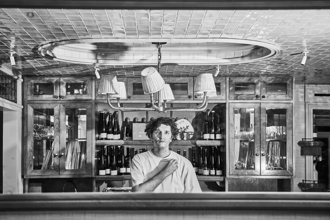 Angelos behind the bar